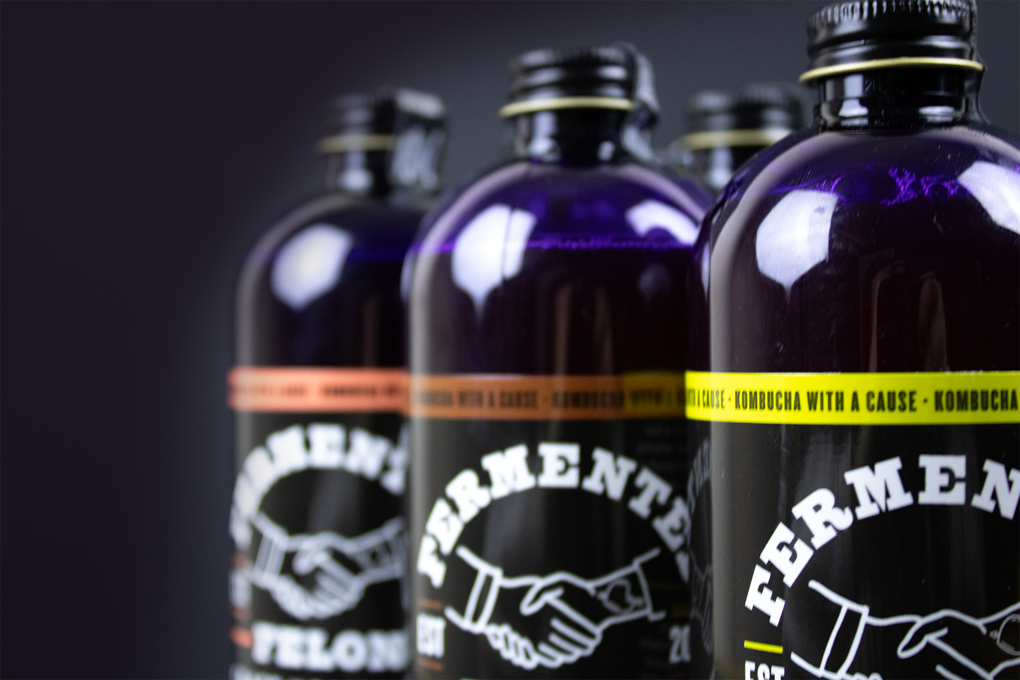 Bottles of kombucha root beer peach and pear good for your gut probiotic